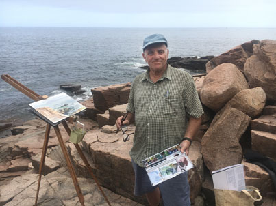 Ronald Katz painting outdoors at a seaside bay along the Maine coast.